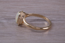 Load image into Gallery viewer, Oval cut Natural Opal set Yellow Gold Ring