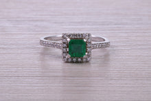 Load image into Gallery viewer, Square cut Natural Emerald Halo and Shoulder set With Diamonds in This 18ct White Gold Ring