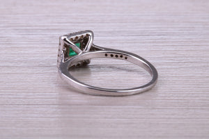 Square cut Natural Emerald Halo and Shoulder set With Diamonds in This 18ct White Gold Ring