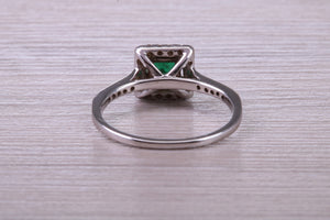 Square cut Natural Emerald Halo and Shoulder set With Diamonds in This 18ct White Gold Ring