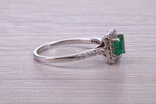 Load image into Gallery viewer, Square cut Natural Emerald Halo and Shoulder set With Diamonds in This 18ct White Gold Ring