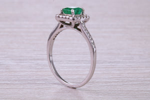 Square cut Natural Emerald Halo and Shoulder set With Diamonds in This 18ct White Gold Ring