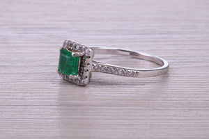 Square cut Natural Emerald Halo and Shoulder set With Diamonds in This 18ct White Gold Ring