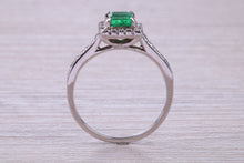 Load image into Gallery viewer, Square cut Natural Emerald Halo and Shoulder set With Diamonds in This 18ct White Gold Ring