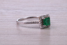 Load image into Gallery viewer, Square cut Natural Emerald Halo and Shoulder set With Diamonds in This 18ct White Gold Ring