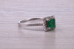 Square cut Natural Emerald Halo and Shoulder set With Diamonds in This 18ct White Gold Ring