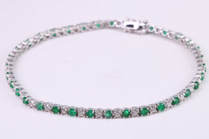 Four and Half carats Natural Emeralds and Diamonds set White Gold Tennis Bracelet, British Hallmarked